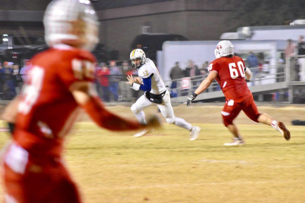 Ohatchee lineman Tristan Garcia chases down Randolph County quarterback Brody Wortham, just like he did on the final play of the game Friday night. (Jeremy Wortham/TigerDen Photography) 