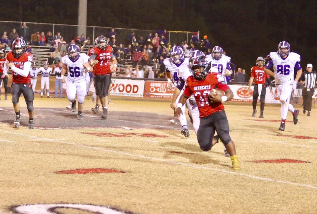 Tyrik Hall rushed for four touchdowns in Weaver's win over Lexington. On the cover, Weaver coach Daryl Hamby greets Chris Lemon as he comes off the field. (All photos by Kristen Stringer/Krisp Pics Photography)