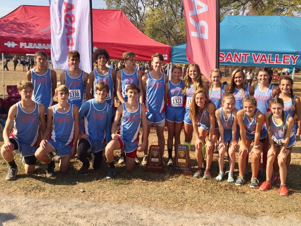 The Pleasant Valley cross country teams stand with the trophies they brought home from the state cross-country meet. (Photo courtesy of Tara Hood)