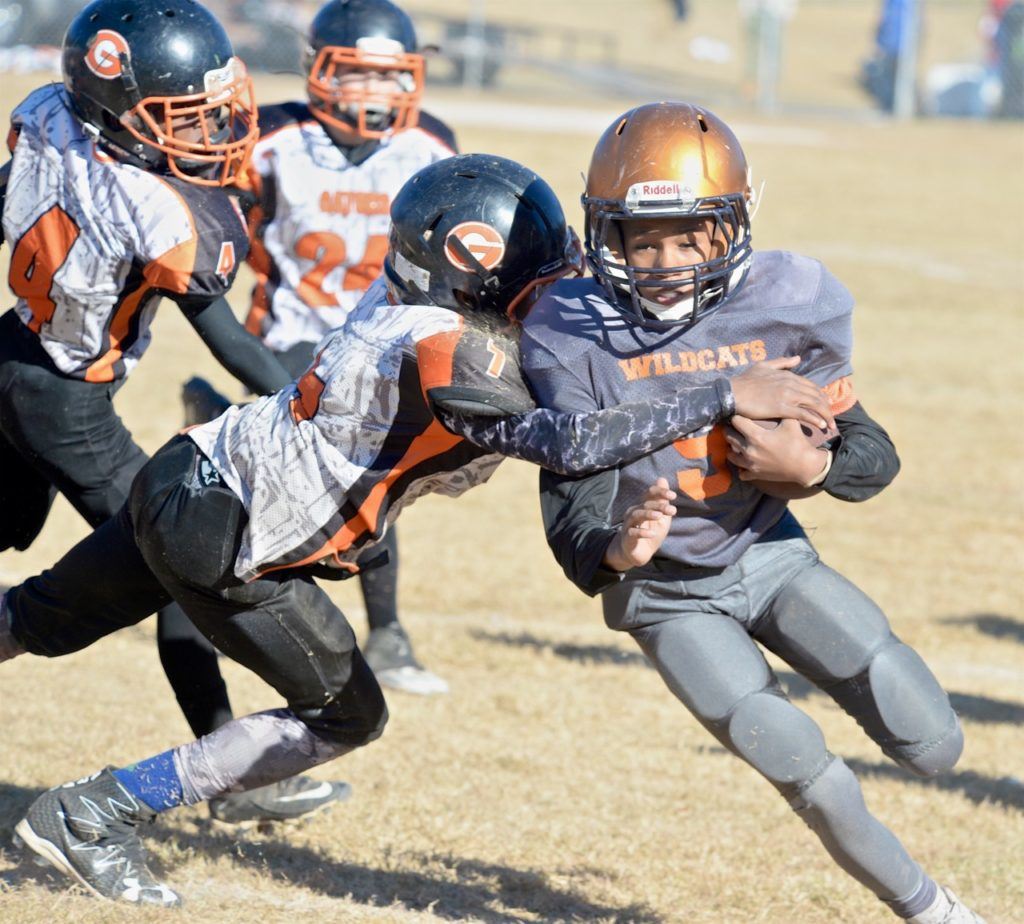 Jacory Russell wraps up a Fultondale ballcarrier during the East Alabama Gators' 10U title game.