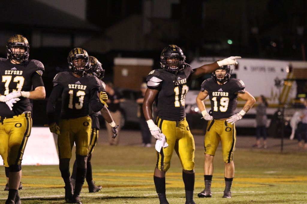 K.J. Britt sets the Oxford defense in what would be the final game of his high school career. On Monday, the four-star linebacker announced his commitment to play at Auburn. (Photo by Kristen Stringer/Krisp Pics Photography)