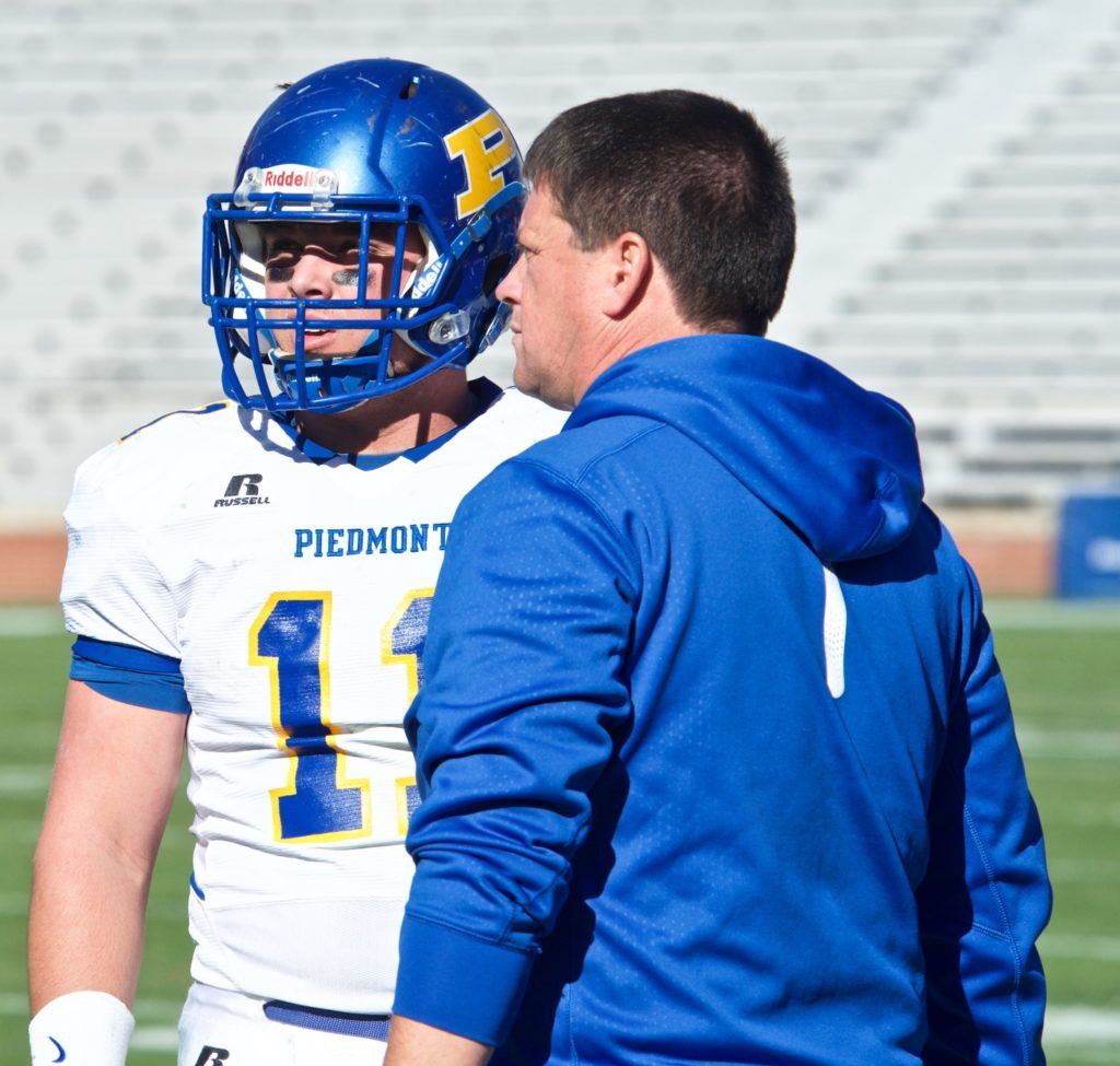 Piedmont coach Steve Smith (R) has placed his trust in Taylor Hayes and the quarterback has delivered back-to-back state championships. (Photos by B.J. Franklin/GungHo Photos)