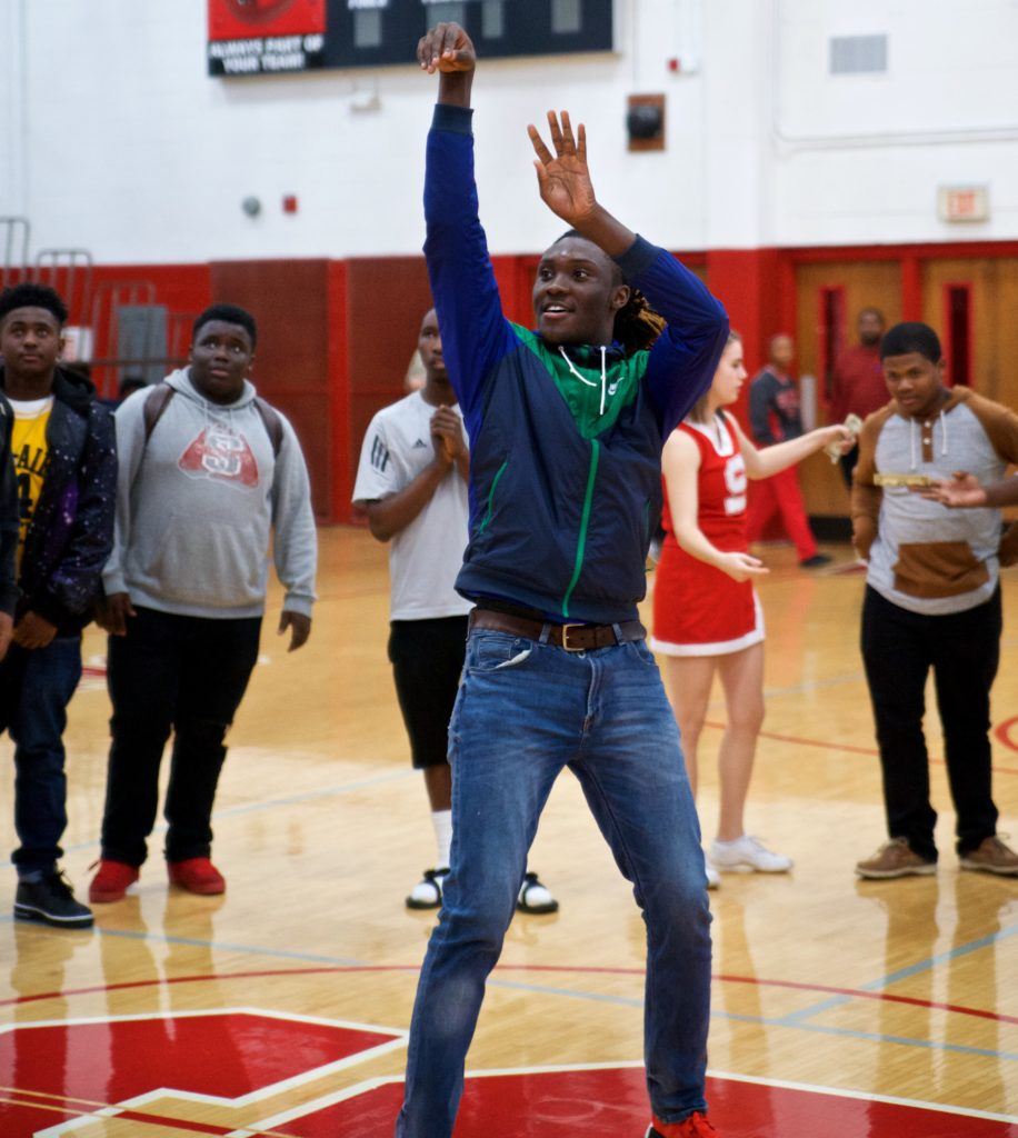 Davyn Flenord's long-range shooting skills didn't leave him when the game ended. He drained a midcourt shot during a halftime promotion in the girls game. (Photo by B.J. Franklin/GungHo Photos)