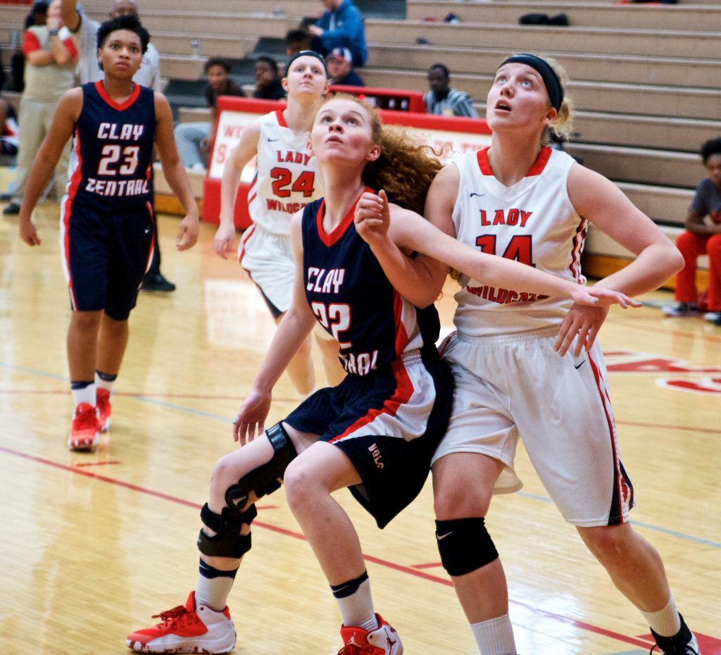 Saks' Summer Baxter (14) tries to maneuver around Clay Central's Claire Daugherty for a rebound. (Photo by B.J. Franklin/GungHo Photos)