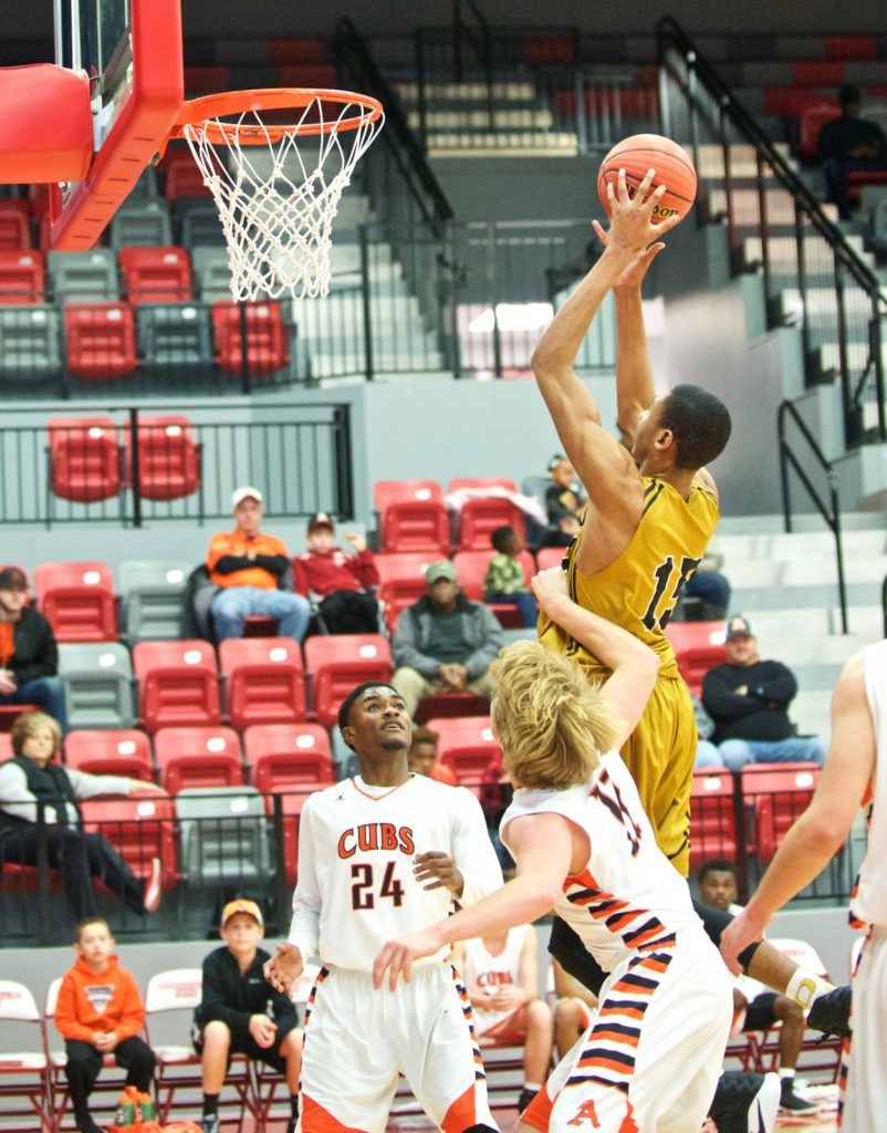 Oxford freshman Zondrick Garrett goes hard to the basket against Alexandria. (Photo by B.J. Franklin/GungHo Photos)