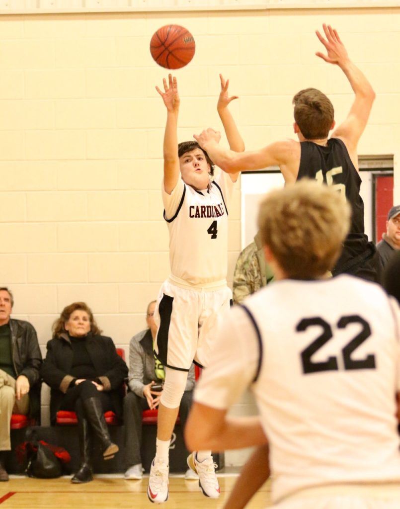 Jack Miller (4) had a confident shot for a freshman playing his first varsity game in Sacred Heart's 89-69 win over Faith Christian. (Photo by Kristen Stringer/KrispPics Photography)