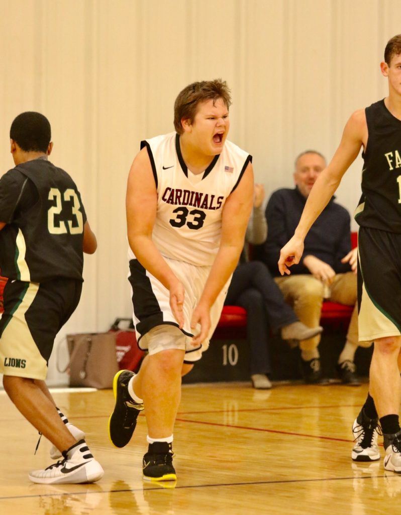 Zane Marion and the rest of the Sacred Heart reserves who played a role in the Cardinals' victory Thursday night had reason to be excited. (Photo by Kristen Stringer/KrispPics Photography)