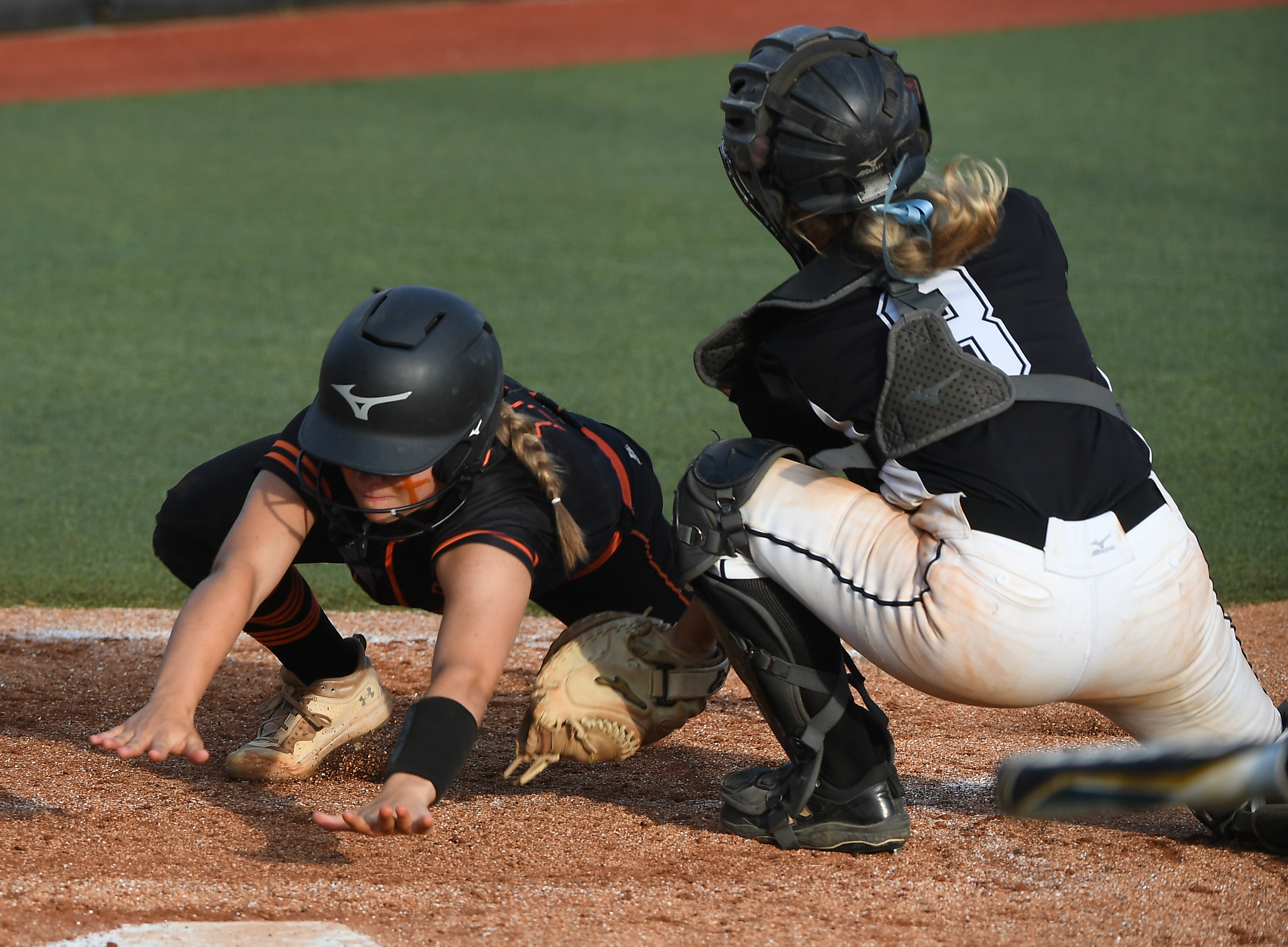 Hayden catcher Kiley Christopher puts the tag on Alexandria’s Charlee Parris aat the plate to temporarily keep the Lady Cubs from tying Game 1 of their Class 5A championship doubleheader. (Photo by B.J. Franklin)