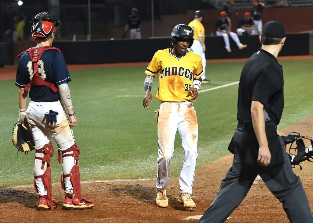 Josh Cooper crosses the plate with an insurance run in the Monsters’ win over Gwinnett Friday night. (Photo by B.J. Franklin)