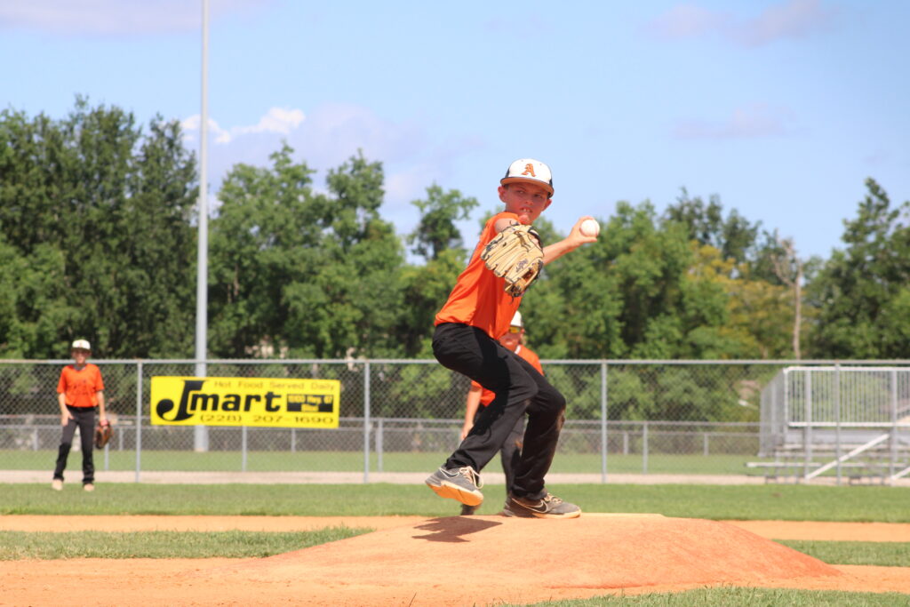 Tournament MVP Anderson Brooks delivers a pitch in Alexandria’s USSSA 10U World Series championship game victory.