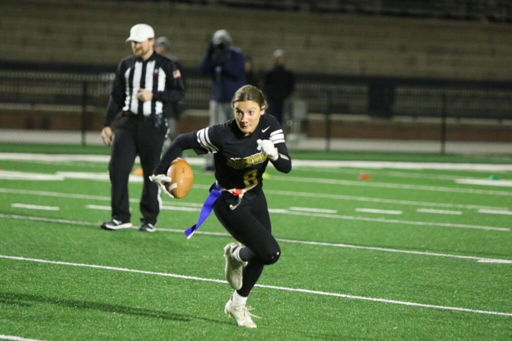 Oxford’s Ashlyn Burns breaks for the corner and into the open field during the Lady Jackets’ state semifinal flag football playoff win over Vestavia Hills. (Photos by Mike Lett/Lett’s Focus Photography)