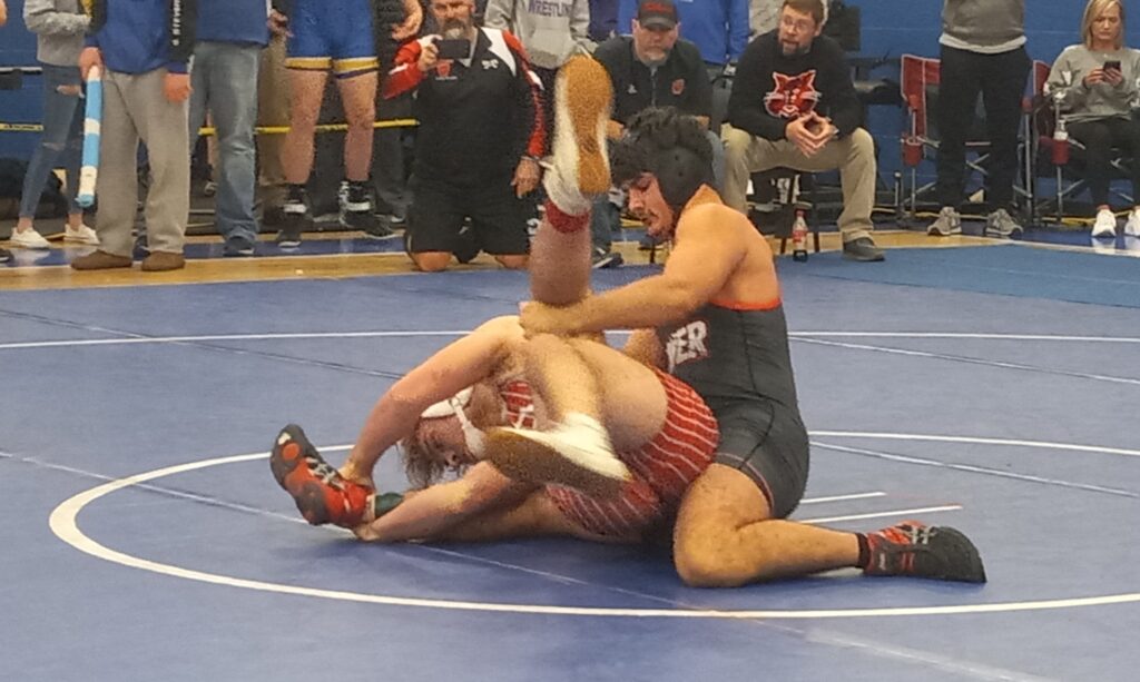 Weaver’s Anthony Usry tries to gain leverage on Ohatchee’s Cody Freer during their 184-pound final in Saturday’s Piedmont Dogfight at Piedmont Middle School. Usry was one of Weaver’s two bracket winners. (Photo by Joe Medley)