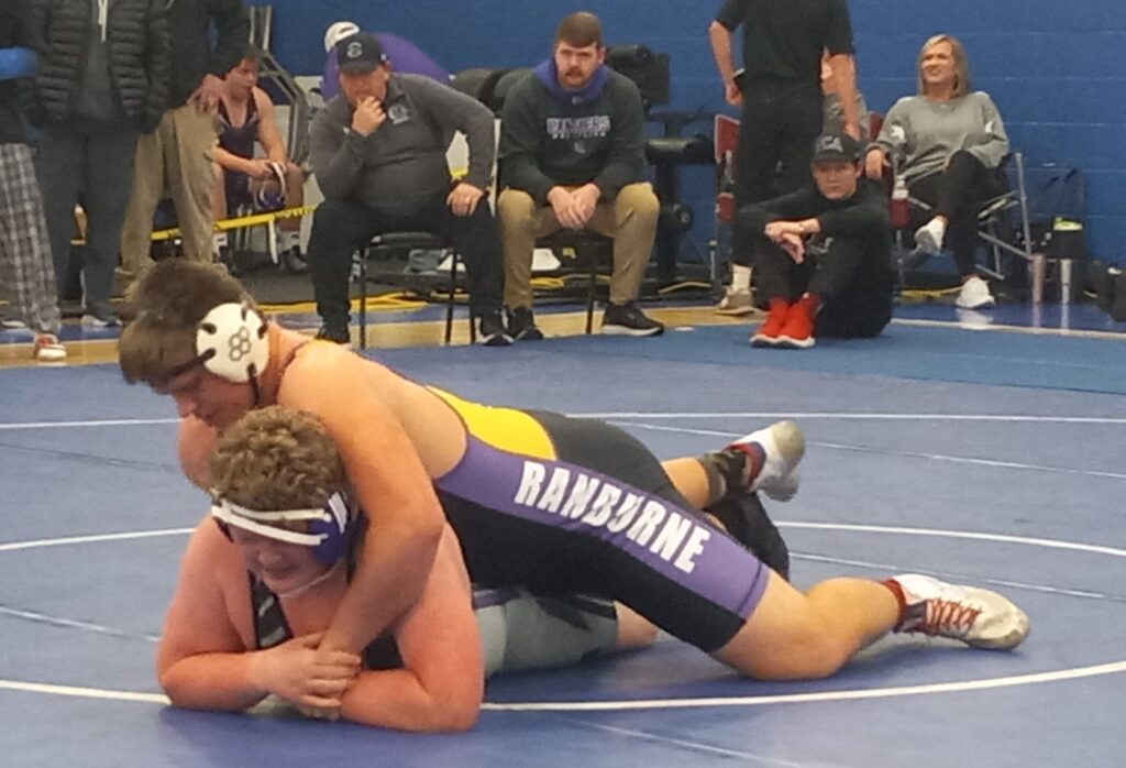 Ranburne’s Carson Hall nears a pin of Prattville Christian’s Aiden Cockrell during their 287-pound final in Saturday’s Piedmont Dogfight. Ranburne took second place in team standings with 120 points. (Photo by Joe Medley)
