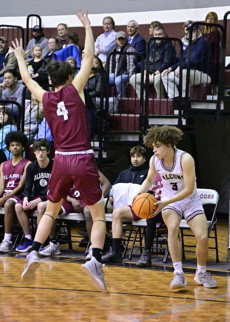 Isaiah Smith pulls up at the 3-point line in the face of the defense of ASD’s Taylor Dubose. Smith drew a start and scored eight points. (Photos by B.J. Franklin)