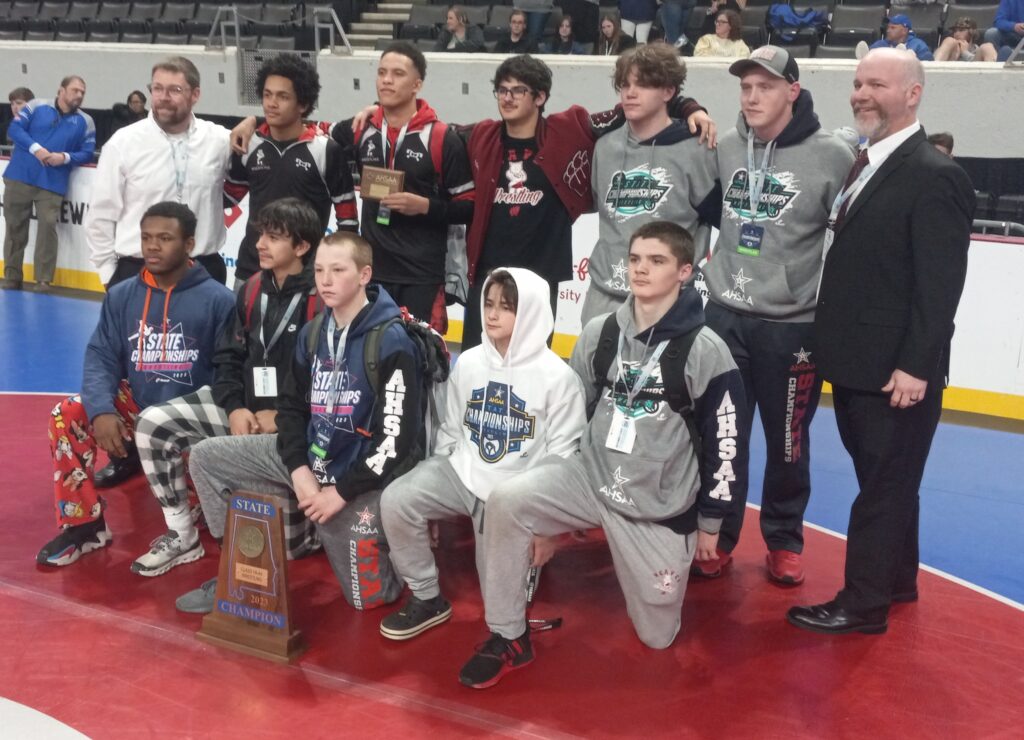 Weaver, the 2023 Class 1A-4A Alabama state wresting champion, poses for pictures after the state tournament concluded Saturday in Huntsville’s Von Braun Center. (Photo by Joe Medley)