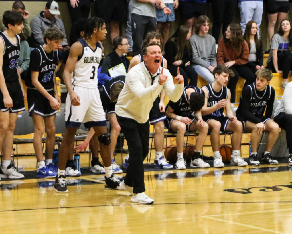 White Plains coach Chris Randall shouts instructions during Saturday’s Class 4A, Area 10 championship game at Jacksonville. Jacksonville won 69-48. Both teams go on to the subregional round of the AHSAA playoffs. (Photo by Greg Warren)