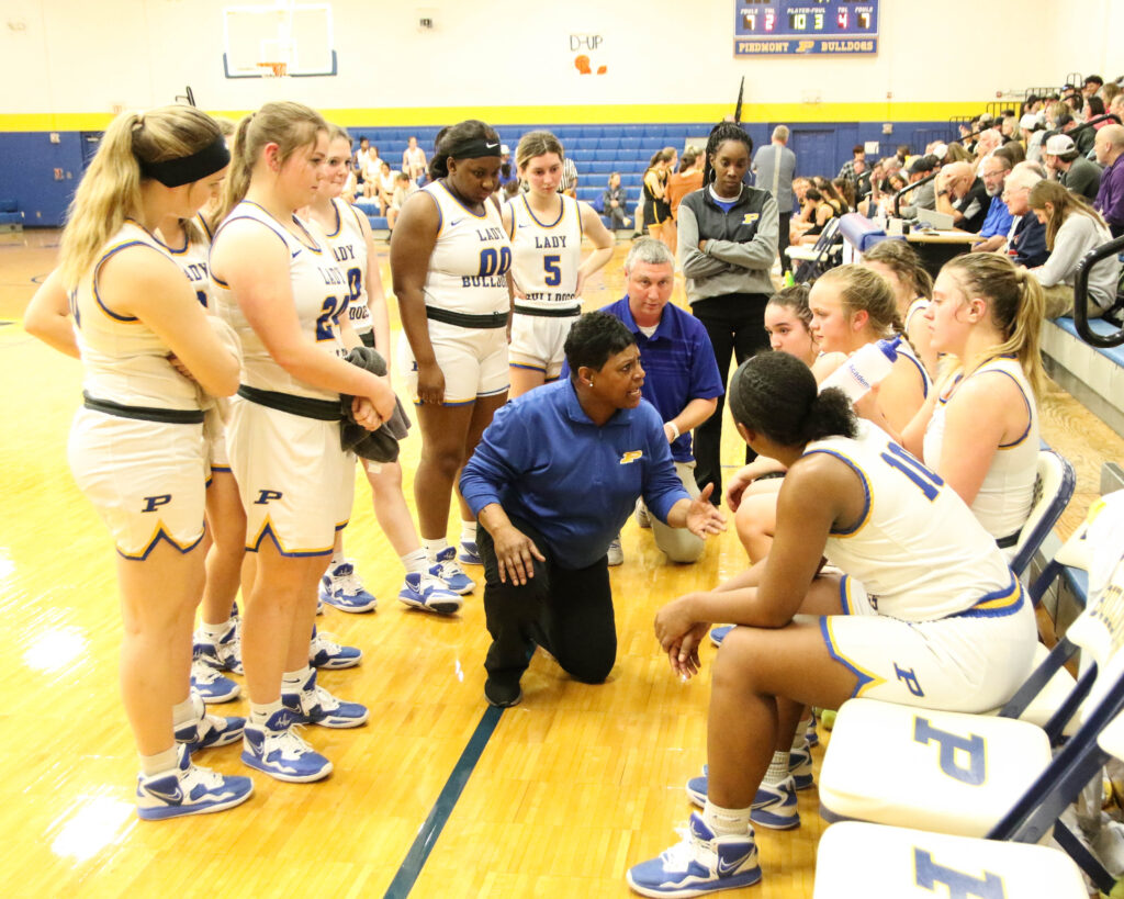 Piedmont coach Terrace Ridley talks to her team during a timeout in Monday’s subregional game at Piedmont. (Photo by Greg Warren)