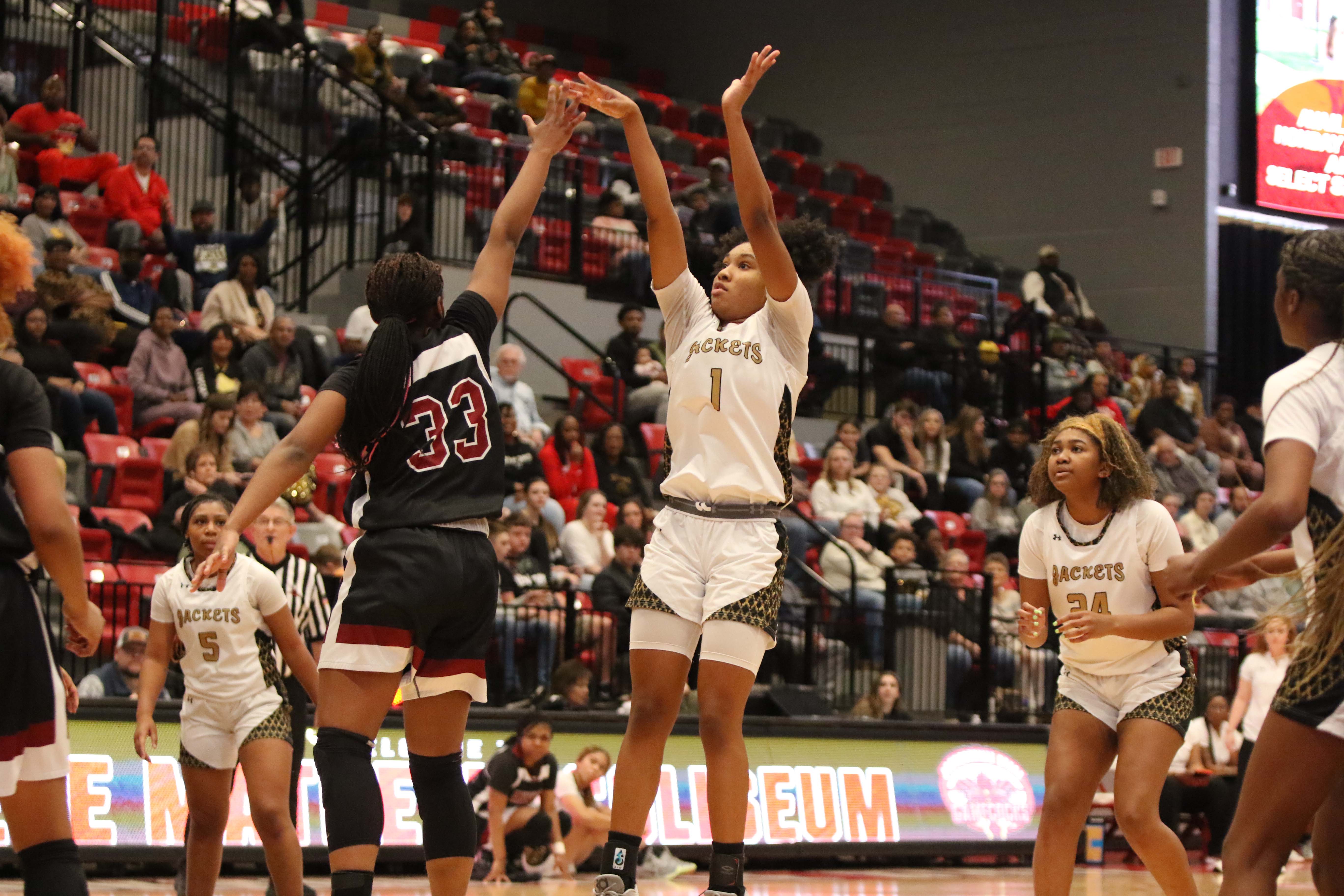 Oxford’s Xai Whitfield launches a jumper against Anniston in the Calhoun County final. She’s the East Alabama Sports Today Class 4A-6A All-Calhoun County girls’ player of the year. (Photo by Mike Lett/lettsfocus.smugmug.com)