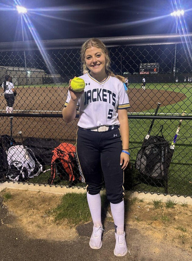 Berkley Mooney poses with her home run ball at Pell City on Wednesday. (Submitted photo)