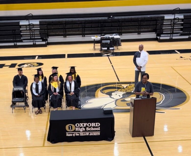 Athens High School softball seniors hold their graduation on Oxford’s Larry Davidson Court on Thursday. (Submitted photo)