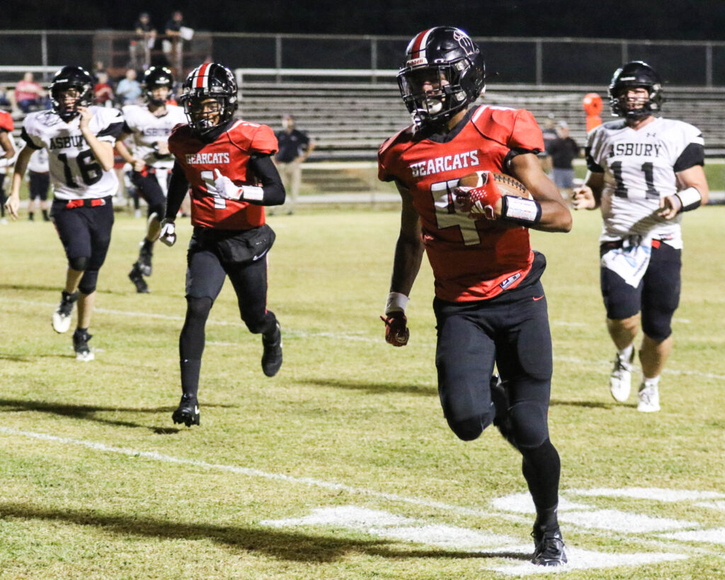 Weaver’s KeShawn Allen returns a punt for a touchdown against Asbury on Friday at Weaver. (Photo by Greg Warren/For East Alabama Sports Today.)