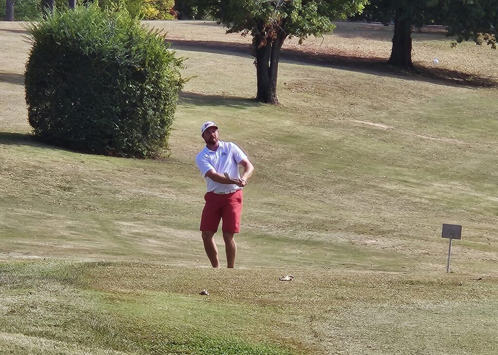 Andrew Brooks approaches on the way to a birdie on No. 14 during Sunday’s Calhoun County Match Play final. (Photo by Joe Medley)