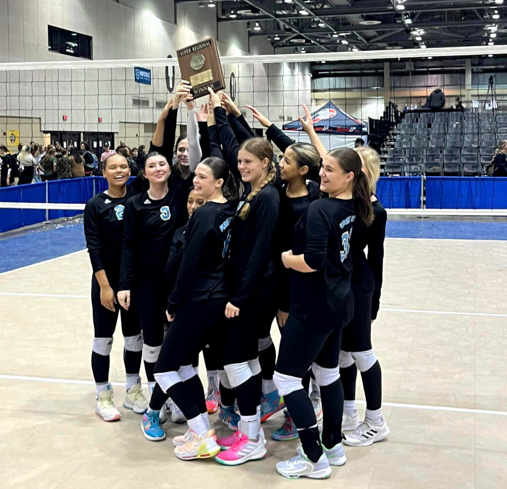 Pleasant Valley players hoist their North Super Regional championship trophy Thursday in Huntsville. (Photo by Krista Larkin/For East Alabama Sports Today)