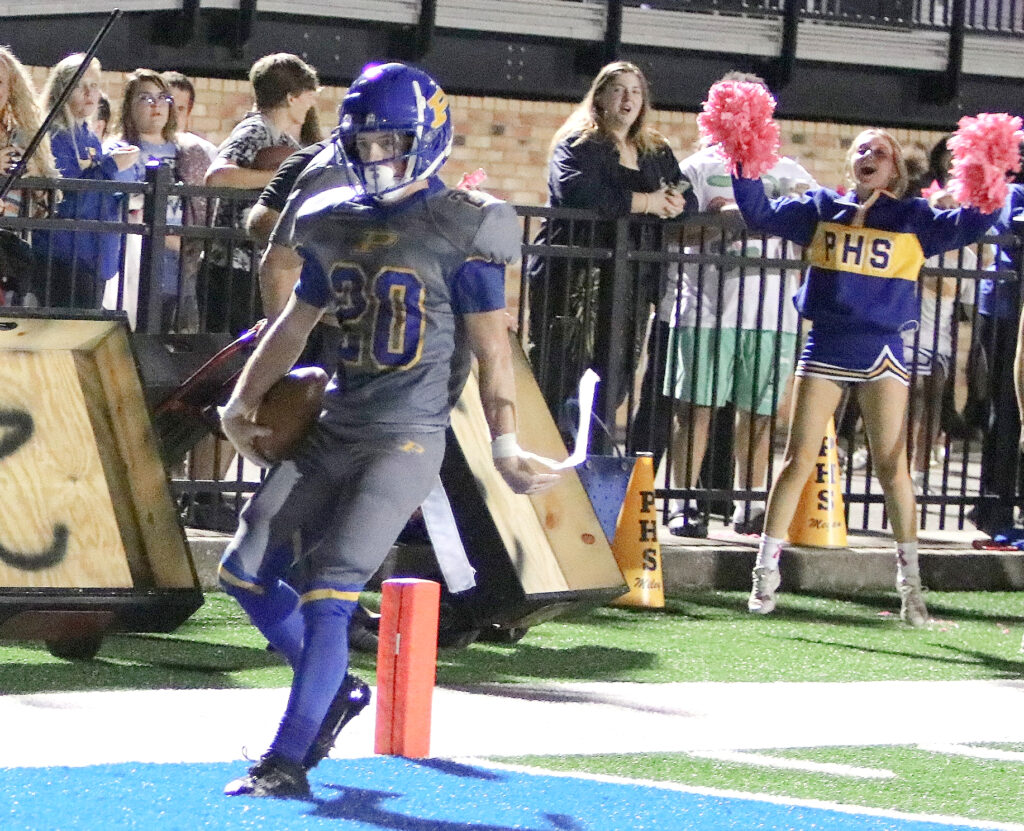 Trevor Pike crosses the goal line during Piedmont’s 35-19 victory over Westbrook Christian on Friday on Piedmont’s Field of Champions. (Photo by Jean Blackstone/For East Alabama Sports Today)