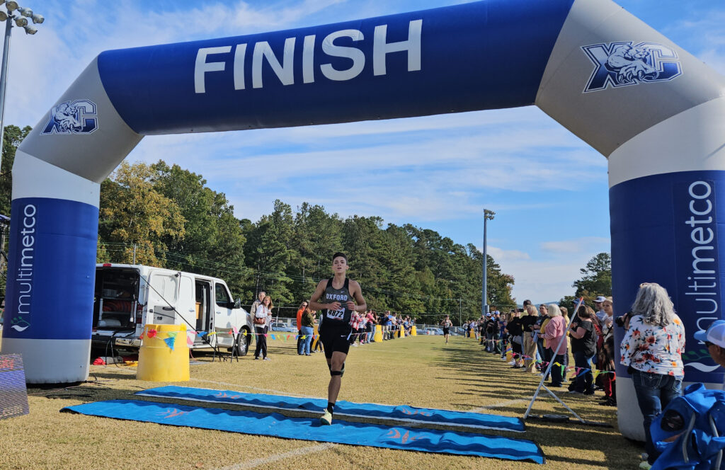 Oxford’s Isaac Williams wins the Calhoun County meet on Oct. 19 at McClellan. He also posted the best time (17:03.32) among boys from Calhoun County at the state meet Nov. 11 in Oakville, edging Pleasant Valley’s Braxton Williams (17:05.38), who improved on his county time by a minute and 16 seconds. (Photo by Joe Medley)