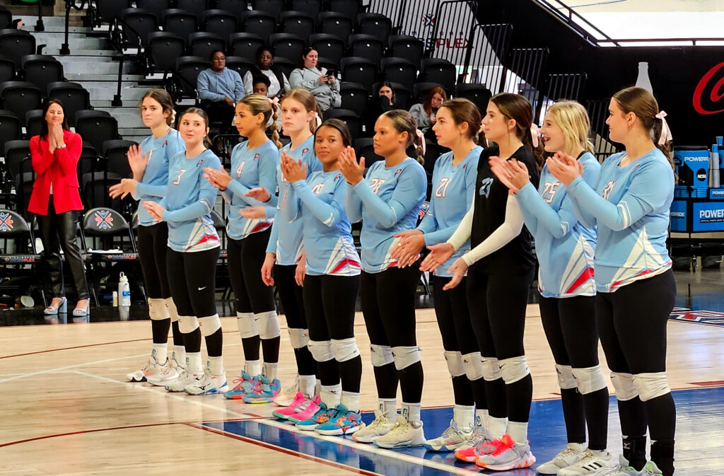 Pleasant Valley’s team lines up for introductions before Wednesday’s Class 2A final against Sand Rock as retiring head coach Dana Bryant watches from the sideline. (Photo by Joe Medley)