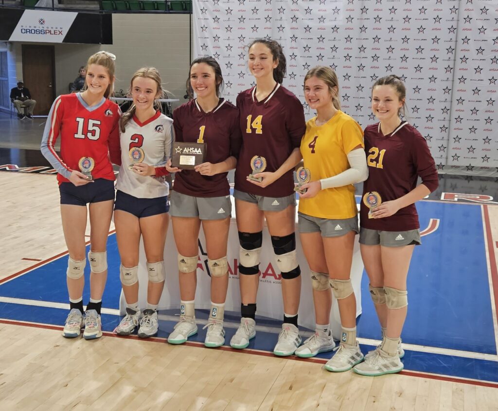 The Class 1A state volleyball all-tournament team (from left): University Charter’s Ella Grace Larkin and Ava LaCoste, Spring Garden’s Ace Austin (MVP), Chloe Rule, Layla Ingram and Avery Steward. (Photo by Joe Medley)