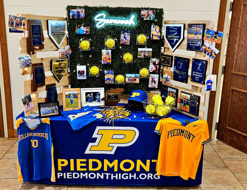 Savannah Smith’s memorabilia display, constructed by her mom, Rachel Smith, for Thursday’s ceremony marking her signing to play softball for Jacksonville State. (Photo by Joe Medley)