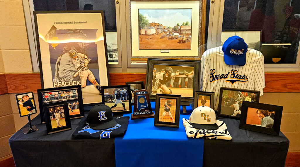 Forrest Heacock’s memorabilia display for Friday’s signing ceremony at Oxford High School. (Photo by Joe Medley)