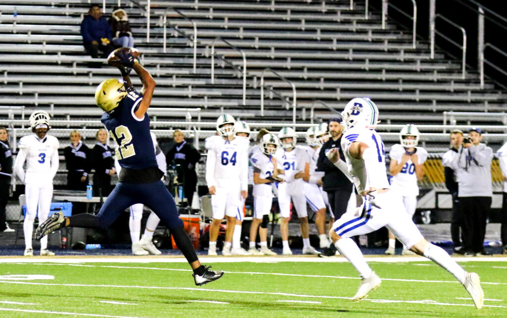 Jacksonville’s Damonte Sinclair catches a pass against Bayside Academy on Friday. (Photo by Greg Warren/For East Alabama Sports Today)