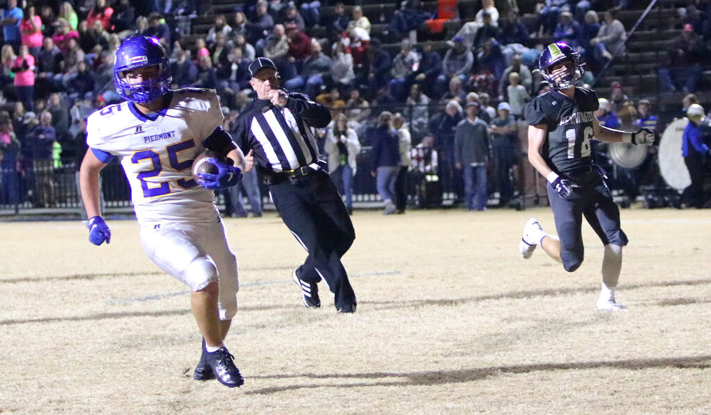 Piedmont’s Luke Rhinehart scores a touchdown against J.B. Pennington during Friday’s first-round playoff action. (Photo by Jean Blackstone/For East Alabama Sports Today)