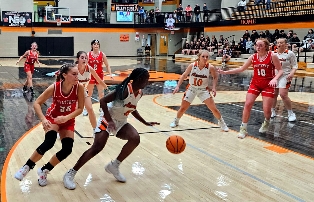 Alexandria’s Sumira Duncan goes for a loose ball as Ohatchee’s Kiana Garber pursues during their game Friday at Alexandria. (Photo by Joe Medley)