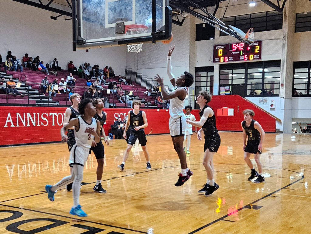 Anniston’s Delroy Francis goes up for two points as Anniston gets off to a 7-0 start against undefeated Fort Payne on Tuesday at home. Fort Payne won 42-36. (Photo by Joe Medley)