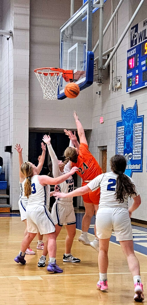 Alexandria’s Pressley Slaton goes up for two points at White Plains on Thursday. (Photo by Joe Medley)