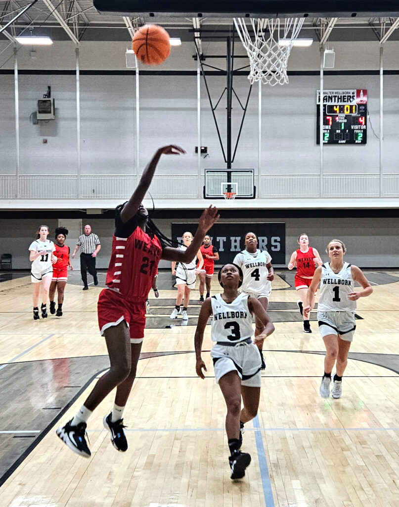 Weaver’s Aaliyah Marks gets a fast break bucket against Wellborn on Tuesday. (Photo by Joe Medley)