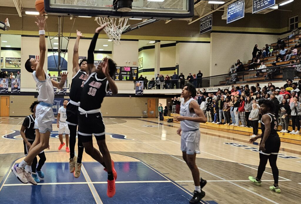 Jacksonville’s Devin Barksdale goes to the hoop for two early in Anniston’s 46-44 victory Thursday at Jacksonville. (Photo by Joe Medley)