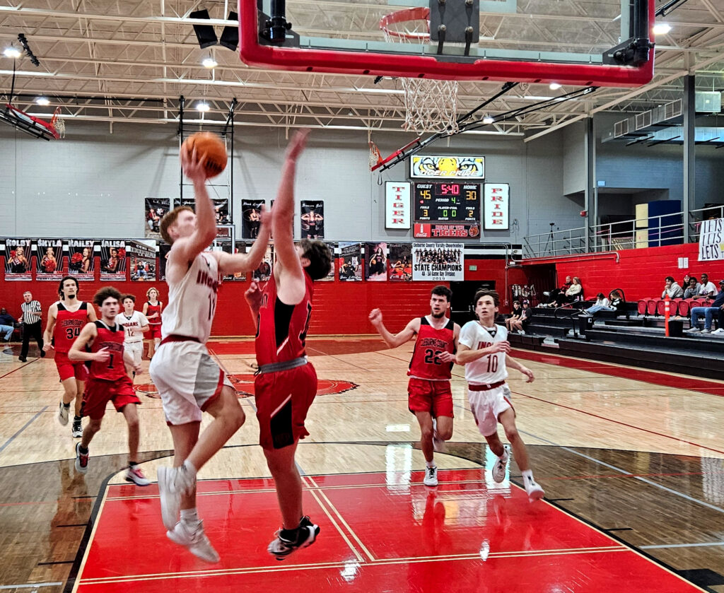 Ohatchee’s Colby Hester drives against Cleburne County during Thursday’s action in the Heflin Holiday Hoops Classic. (Photo by Joe Medley)