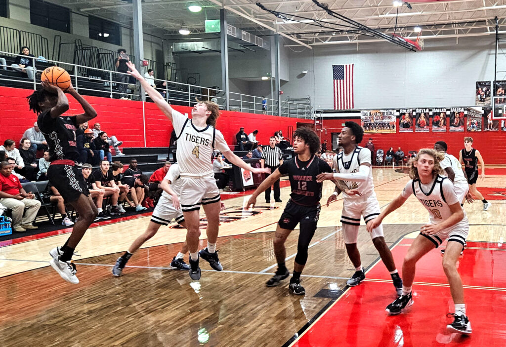 Weaver’s D.J. Marbury shoots against Randolph County during Thursday’s Heflin Holiday Classic boys’ semifinals. The Bearcats advanced to the final. (Photo by Joe Medley)