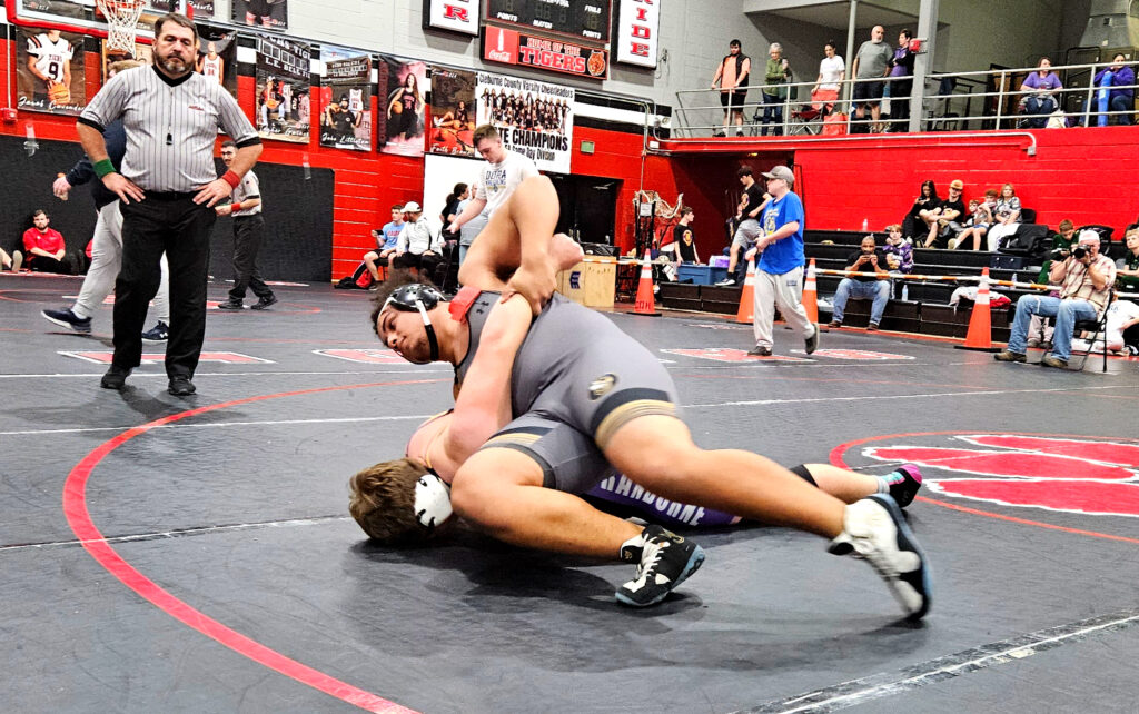 Oxford’s Caleb Tinner works his way to a pin in the Rumble in the Jungle 287-pound championship final on Saturday. (Photo by Joe Medley)