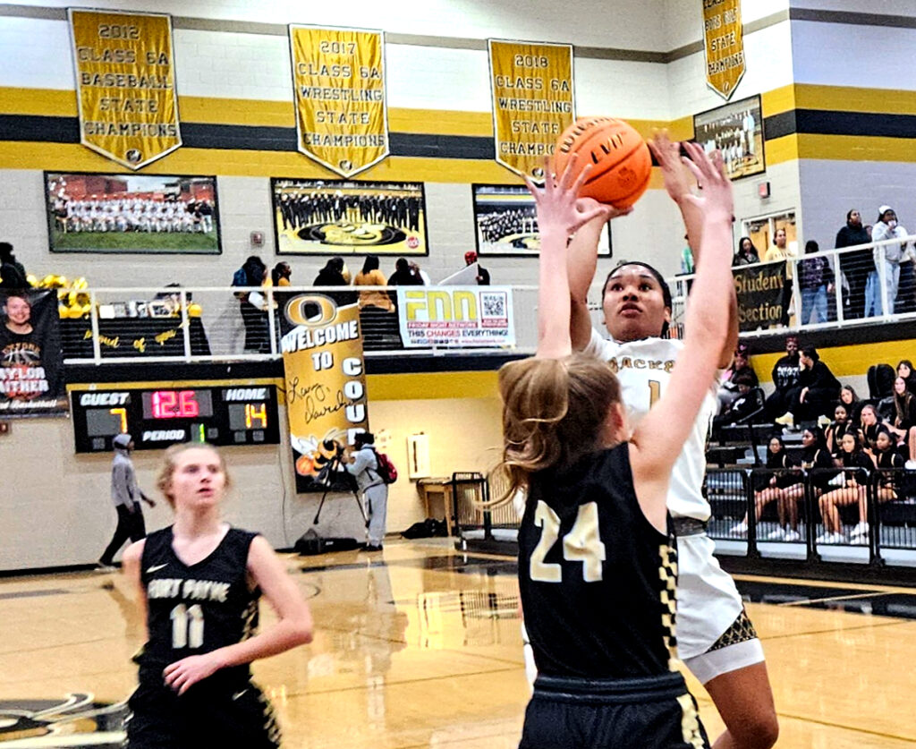 Senior Xai Whitfield goes up for two of her 33 points in Oxford’s 71-52 victory over Fort Payne on Tuesday at Oxford. (Photo by Joe Medley)