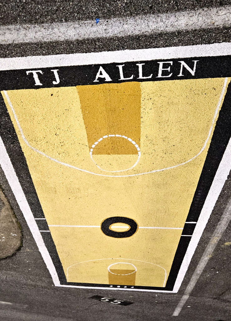 T.J. Allen’s painted senior parking space in the upper parking lot, across the street from Oxford Sports Arena. (Photo by Joe Medley)