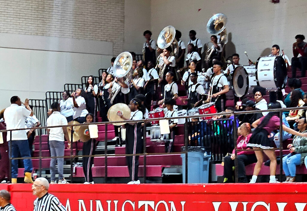 Members of Anniston’s marching band fill the gym with sound during Friday’s boy-girl doubleheader with Handley. (Photo by Joe Medley)