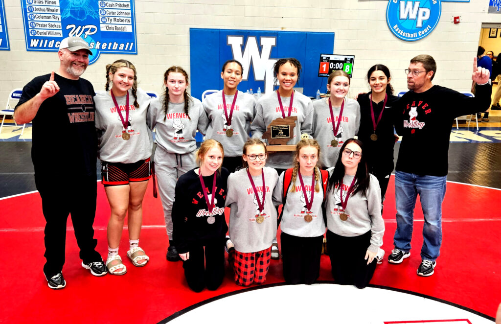 Led by head coach Andy Fulmer (right), Weaver won the first-ever girls’ Calhoun County wrestling tournament, at White Plains. (Photo by Joe Medley)