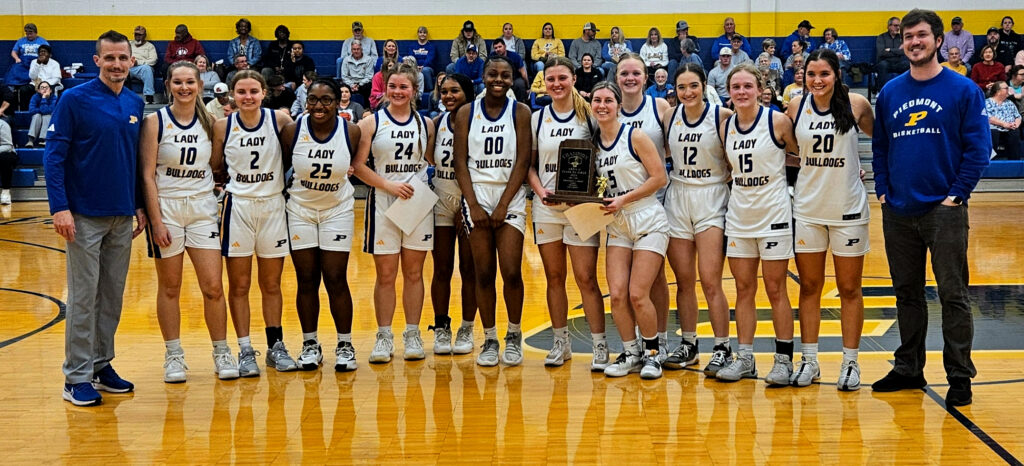 Piedmont’s girls beat Weaver 62-38 on Tuesday to make it back-to-back area titles for the first time since 1991 and 1992. (Photo by Joe Medley)