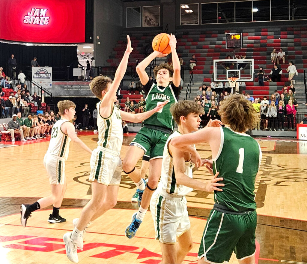 Faith Christian’s Conner Richerhagen shoots a jumper against Skyline during Wednesday’s Class 1A Northeast Regional semifinals in Pete Mathews Coliseum. (Photo by Joe Medley)