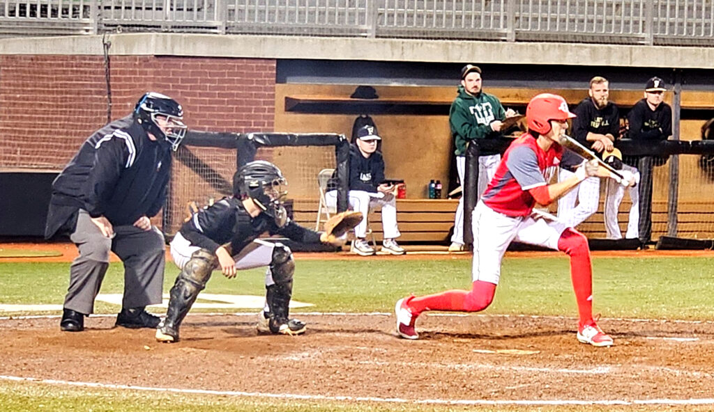 Ohatchee’s Jake Roberson lays down a bunt against Faith Christian on Saturday at Choccolocco Park. (Photo by Joe Medley)